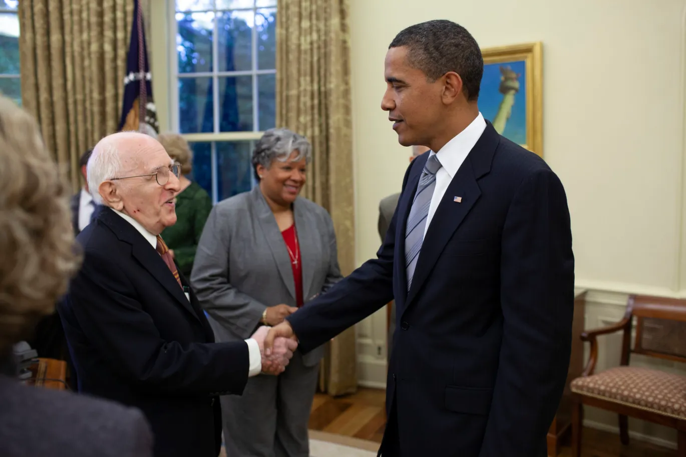 President Obama greets Kamaney in the Oval Office, 2009
