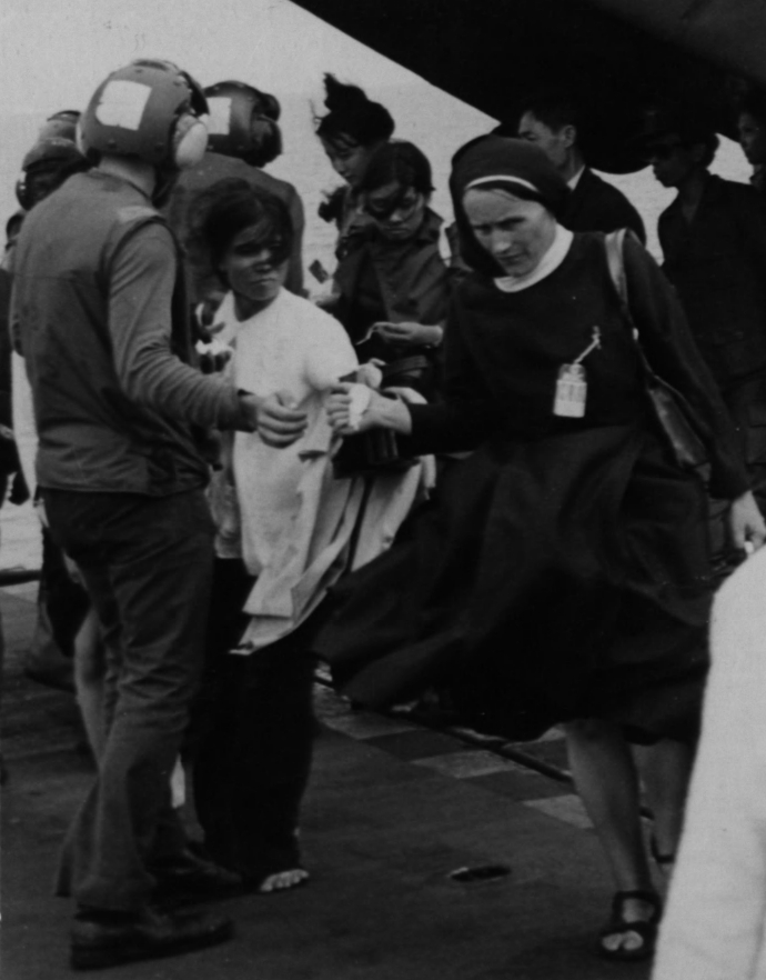 Nun evacuated on the USS Hancock – National Archives Identifier: 26398235