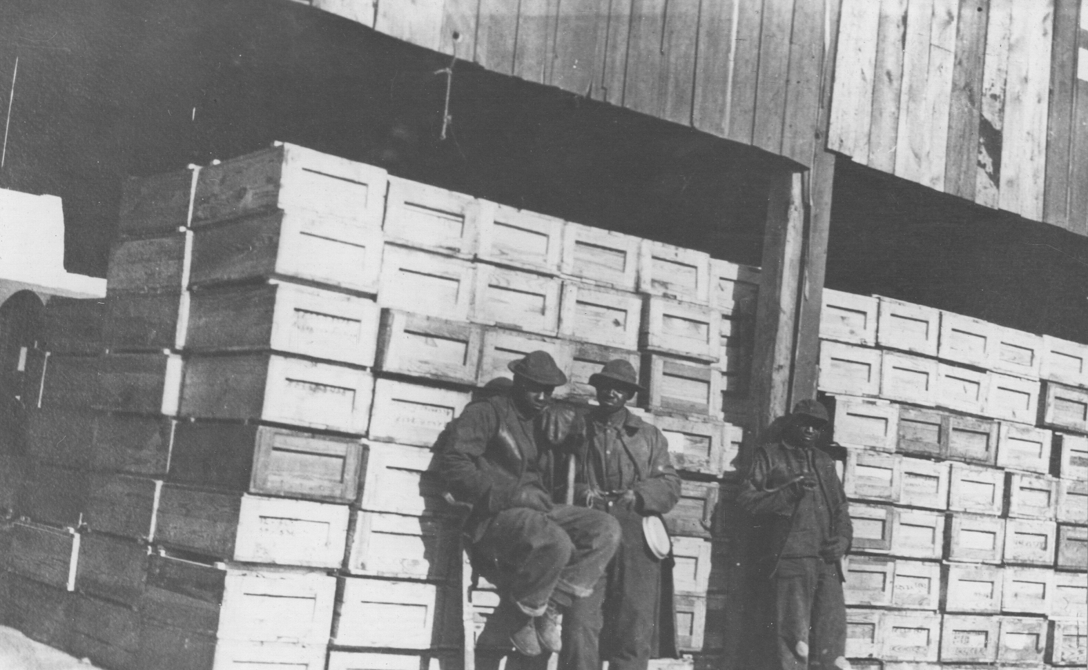 300 boxes of A.L.A. books piled on dock ready to load – National Archives Identifier: 17342987