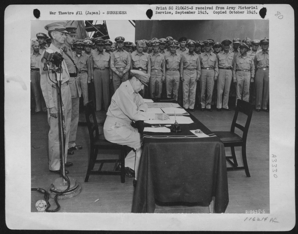 MacArthur signs Japanese surrender agreement – National Archives Identifier: 204835927