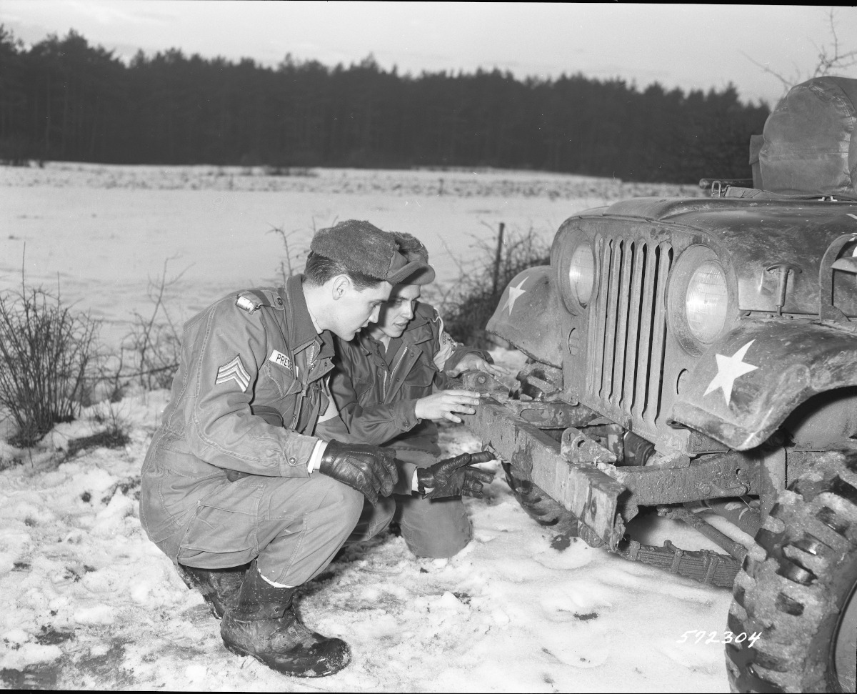 Elvis, fellow 32nd Armor Scout, and army Jeep