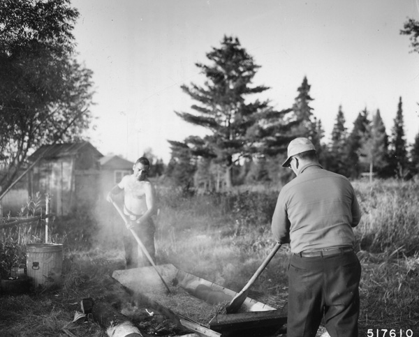 Parching wild rice by hand, 1967