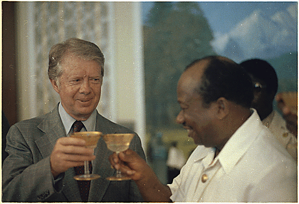 President Jimmy Carter makes a toast with the President of Liberia
